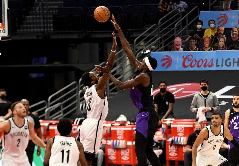 Apr 21, 2021; Tampa, Florida, USA; Toronto Raptors forward Pascal Siakam (43) takes a shot over Brooklyn Nets forward Jeff Green (8) in the first quarter at Amalie Arena. Mandatory Credit: Jonathan Dyer-USA TODAY Sports