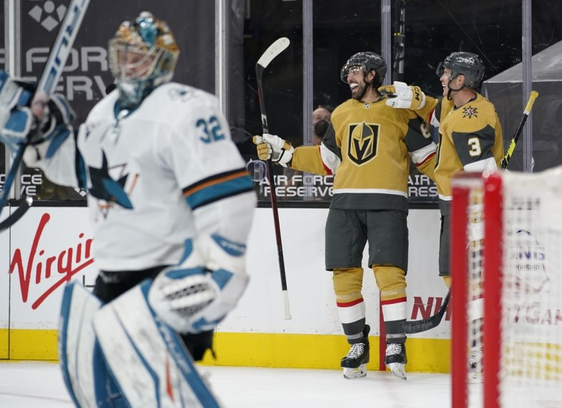 Apr 21, 2021; Las Vegas, Nevada, USA; Vegas Golden Knights right wing Alex Tuch, second from right, celebrates after scoring against San Jose Sharks goaltender Josef Korenar (32) during the second period of an NHL hockey game at T-Mobile Arena. Mandatory Credit:  POOL PHOTOS-USA TODAY Sports