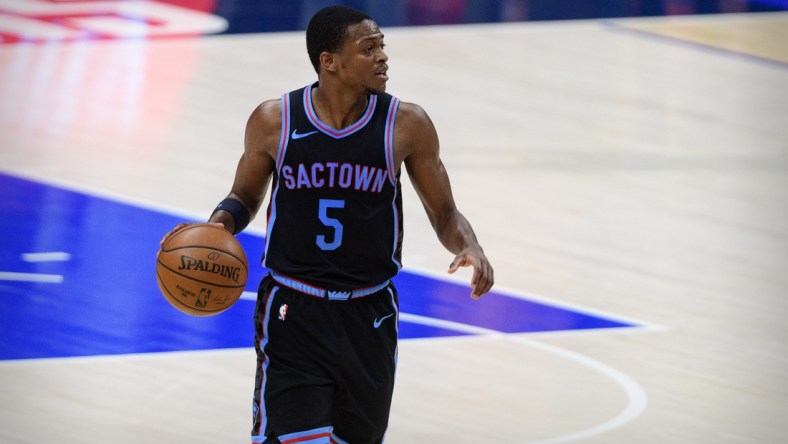 Apr 18, 2021; Dallas, Texas, USA; Sacramento Kings guard De'Aaron Fox (5) in action during the game between the Dallas Mavericks and the Sacramento Kings at the American Airlines Center. Mandatory Credit: Jerome Miron-USA TODAY Sports