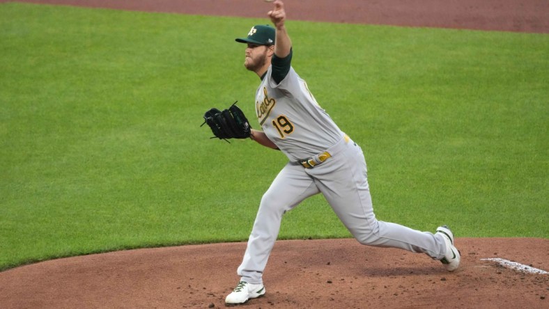 Apr 23, 2021; Baltimore, Maryland, USA; Oakland Athletics pitcher Cole Irvin (19) pitches against the Baltimore Orioles during the first inning at Oriole Park at Camden Yards. Mandatory Credit: Mitch Stringer-USA TODAY Sports