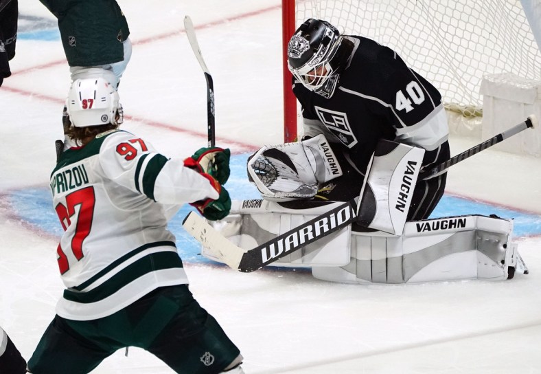 Apr 23, 2021; Los Angeles, California, USA; Minnesota Wild left wing Kirill Kaprizov (97) shoots on goal against Los Angeles Kings goaltender Calvin Petersen (40) during the third period at Staples Center. Mandatory Credit: Gary A. Vasquez-USA TODAY Sports