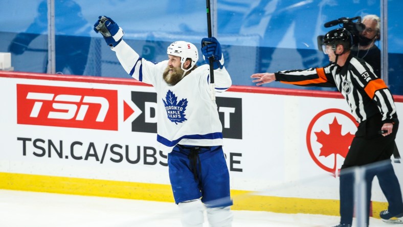 Apr 24, 2021; Winnipeg, Manitoba, CAN;  Toronto Maple Leafs forward Joe Thorton (97) celebrates after scoring a goal against the Winnipeg Jets during the first period at Bell MTS Place. Mandatory Credit: Terrence Lee-USA TODAY Sports