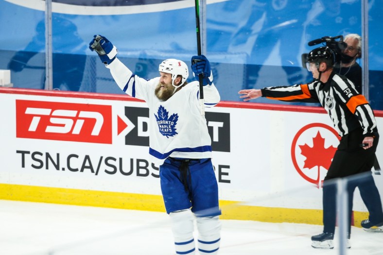 Apr 24, 2021; Winnipeg, Manitoba, CAN;  Toronto Maple Leafs forward Joe Thorton (97) celebrates after scoring a goal against the Winnipeg Jets during the first period at Bell MTS Place. Mandatory Credit: Terrence Lee-USA TODAY Sports