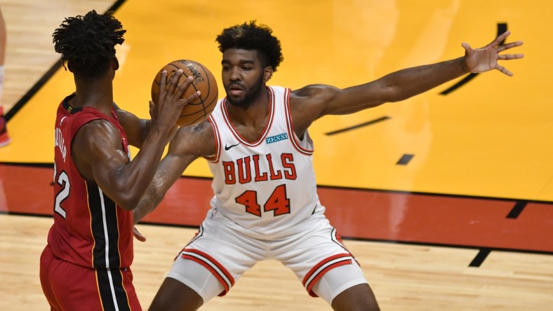 Apr 24, 2021; Miami, Florida, USA; Chicago Bulls forward Patrick Williams (44) pressures Miami Heat forward Jimmy Butler (22) during the first half at American Airlines Arena. Mandatory Credit: Jim Rassol-USA TODAY Sports