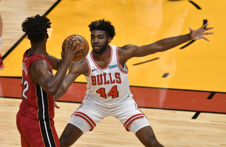 Apr 24, 2021; Miami, Florida, USA; Chicago Bulls forward Patrick Williams (44) pressures Miami Heat forward Jimmy Butler (22) during the first half at American Airlines Arena. Mandatory Credit: Jim Rassol-USA TODAY Sports