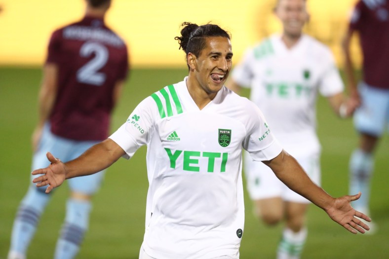 Apr 24, 2021; Commerce City, Colorado, USA; Austin FC midfielder Cecilio Dominguez celebrates after scoring a goal against the Colorado Rapids in the second half during the home opener at Dick's Sporting Goods Park. Mandatory Credit: Mark J. Rebilas-USA TODAY Sports