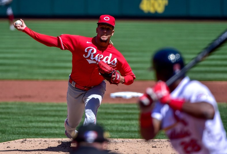 Apr 25, 2021; St. Louis, Missouri, USA;  Cincinnati Reds starting pitcher Luis Castillo (58) pitches to St. Louis Cardinals right fielder Justin Williams (26) during the second inning at Busch Stadium. Mandatory Credit: Jeff Curry-USA TODAY Sports
