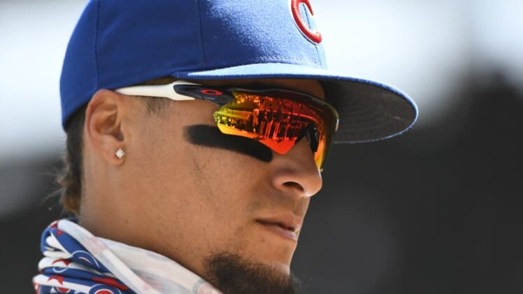 Apr 25, 2021; Chicago, Illinois, USA;  Chicago Cubs shortstop Javier Baez (9) warms up before the game against the Milwaukee Brewers at Wrigley Field. Mandatory Credit: Matt Marton-USA TODAY Sports