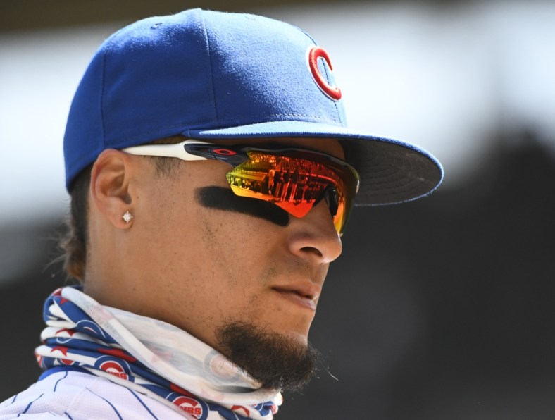 Apr 25, 2021; Chicago, Illinois, USA;  Chicago Cubs shortstop Javier Baez (9) warms up before the game against the Milwaukee Brewers at Wrigley Field. Mandatory Credit: Matt Marton-USA TODAY Sports