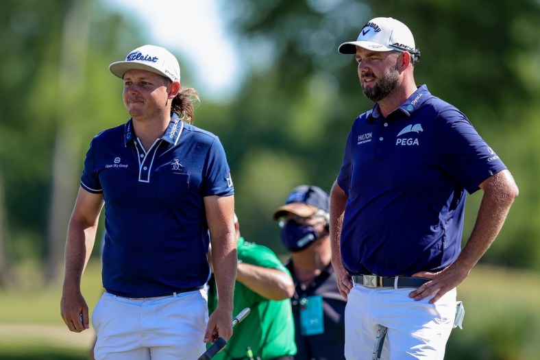 Apr 25, 2021; Avondale, Louisiana, USA;  Cameron Smith and Marc Leishman look on from the 13th green during the final round round of the Zurich Classic of New Orleans golf tournament. Mandatory Credit: Stephen Lew-USA TODAY Sports