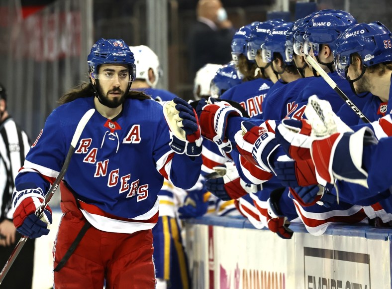 Apr 25, 2021; New York, New York, USA; Mika Zibanejad #93 of the New York Rangers celebrates his goal in the first period against the Buffalo Sabres at Madison Square Garden on April 25, 2021 in New York City.    Mandatory Credit: Elsa/Pool Photo-USA TODAY Sports