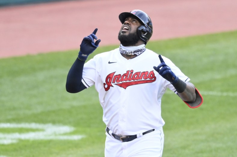 Apr 27, 2021; Cleveland, Ohio, USA; Cleveland Indians designated hitter Franmil Reyes (32) celebrates his solo home run in the second inning against the Minnesota Twins at Progressive Field. Mandatory Credit: David Richard-USA TODAY Sports