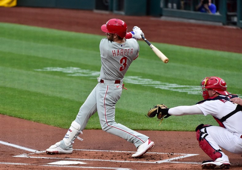 Apr 27, 2021; St. Louis, Missouri, USA;  Philadelphia Phillies right fielder Bryce Harper (3) hits a double during the first inning against the St. Louis Cardinals at Busch Stadium. Mandatory Credit: Jeff Curry-USA TODAY Sports