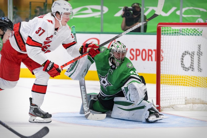 Apr 27, 2021; Dallas, Texas, USA; Dallas Stars goaltender Anton Khudobin (35) defends the goal against Carolina Hurricanes right wing Andrei Svechnikov (37) during the second period at the American Airlines Center. Mandatory Credit: Jerome Miron-USA TODAY Sports