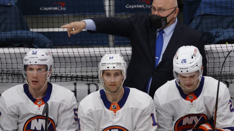 Apr 27, 2021; Washington, District of Columbia, USA; New York Islanders Head Coach Barry Trotz gestures from behind the bench against the Washington Capitals in the second period at Capital One Arena. Mandatory Credit: Geoff Burke-USA TODAY Sports