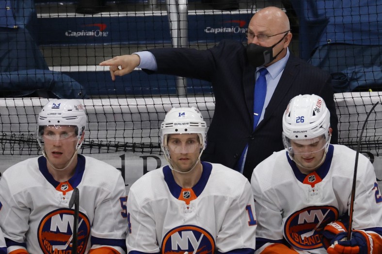 Apr 27, 2021; Washington, District of Columbia, USA; New York Islanders Head Coach Barry Trotz gestures from behind the bench against the Washington Capitals in the second period at Capital One Arena. Mandatory Credit: Geoff Burke-USA TODAY Sports