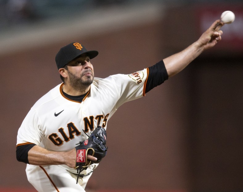 Apr 27, 2021; San Francisco, California, USA; San Francisco Giants pitcher Jos   lvarez (48) pitches against the Colorado Rockies during the fifth inning at Oracle Park. Mandatory Credit: D. Ross Cameron-USA TODAY Sports