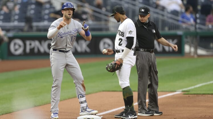 Apr 28, 2021; Pittsburgh, Pennsylvania, USA;  Kansas City Royals third baseman Hunter Dozier (17) reacts after hitting a two-run triple against the Pittsburgh Pirates during the first inning at PNC Park. Mandatory Credit: Charles LeClaire-USA TODAY Sports