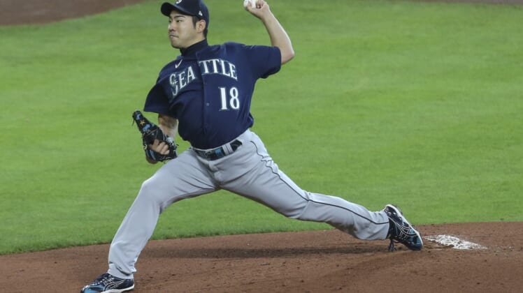 Apr 29, 2021; Houston, Texas, USA; Seattle Mariners starting pitcher Yusei Kikuchi (18) pitches against the Houston Astros in the first inning at Minute Maid Park. Mandatory Credit: Thomas Shea-USA TODAY Sports