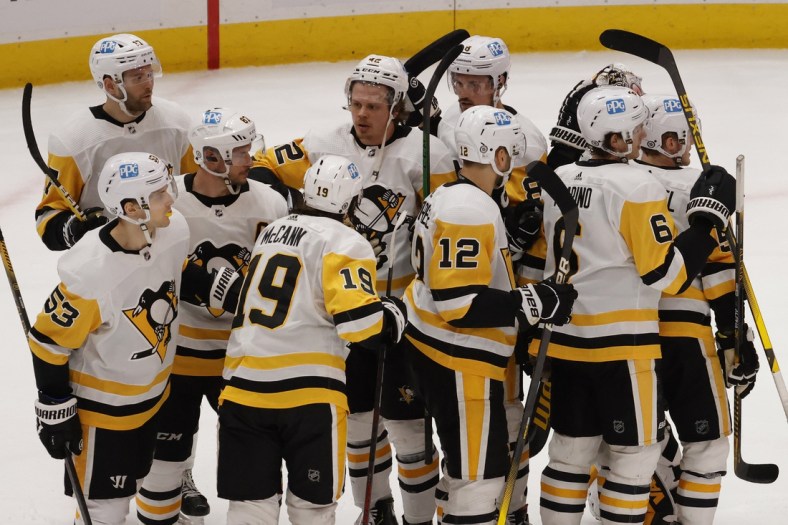 Apr 29, 2021; Washington, District of Columbia, USA; Pittsburgh Penguins left wing Jake Guentzel (59) celebrates with teammates after their game against the Washington Capitals at Capital One Arena. Mandatory Credit: Geoff Burke-USA TODAY Sports