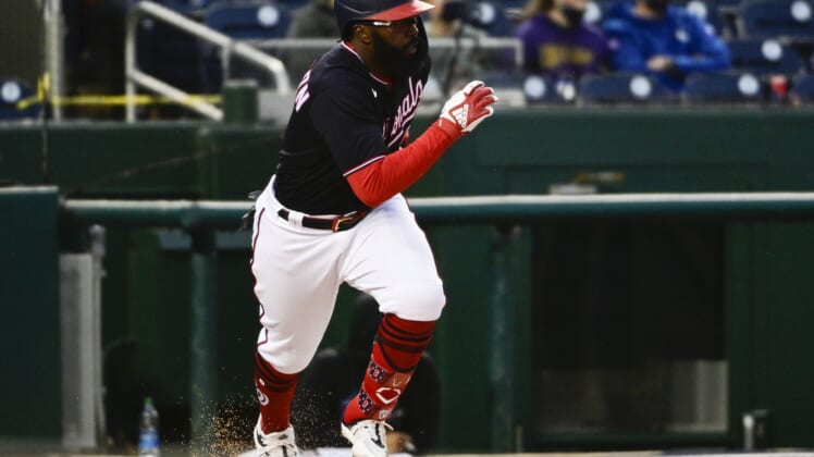 Apr 30, 2021; Washington, District of Columbia, USA;  Washington Nationals second baseman Josh Harrison (5) singles during the first inning against the Miami Marlins at Nationals Park. Mandatory Credit: Tommy Gilligan-USA TODAY Sports