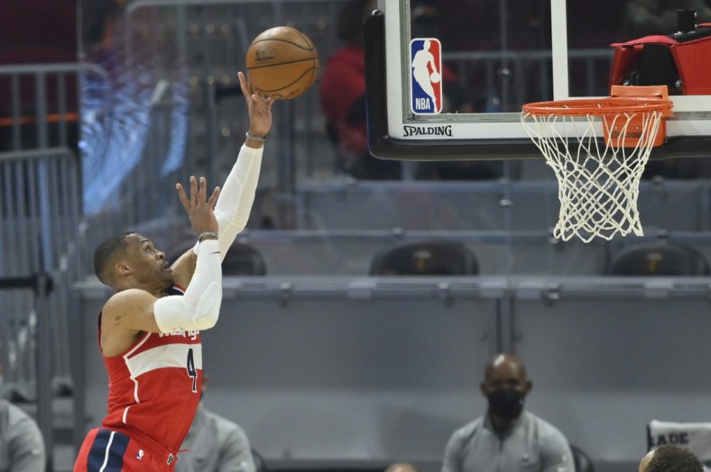 Apr 30, 2021; Cleveland, Ohio, USA; Washington Wizards guard Russell Westbrook (4) shoots in the second quarter against the Cleveland Cavaliers at Rocket Mortgage FieldHouse. Mandatory Credit: David Richard-USA TODAY Sports