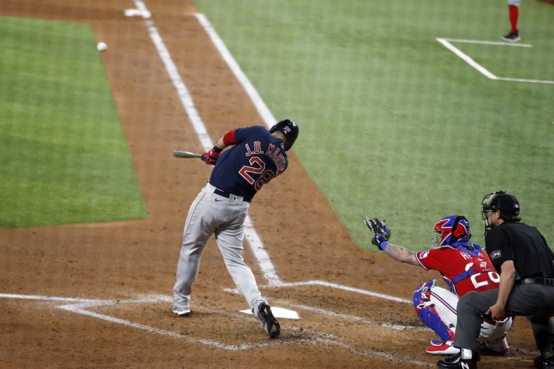 Apr 30, 2021; Arlington, Texas, USA; Boston Red Sox designated hitter J.D. Martinez (28) hits a home run in the third inning against the Texas Rangers at Globe Life Field. Mandatory Credit: Tim Heitman-USA TODAY Sports