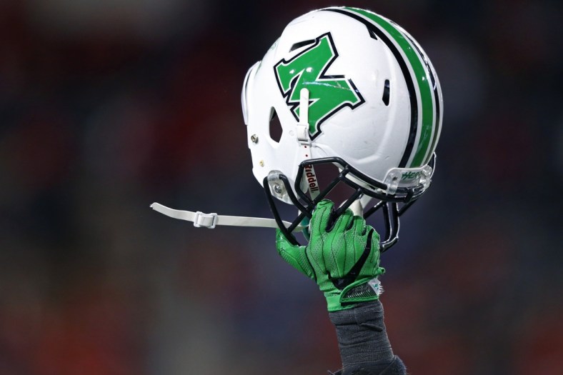 Sep 30, 2017; Cincinnati, OH, USA; A player of the Marshall Thundering Herd holds his helmet to celebrate the touchdown by tight end Ryan Yurachek (not pictured) against the Cincinnati Bearcats in the second half at Nippert Stadium. Mandatory Credit: Aaron Doster-USA TODAY Sports