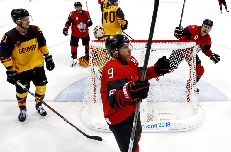 Feb 23, 2018; Gangneung, South Korea; Canada forward Derek Roy (9) celebrates scoring a goal against Germany goaltender Danny Aus Den Birken (33) in the men's ice hockey semifinals during the Pyeongchang 2018 Olympic Winter Games at Gangneung Hockey Centre. Mandatory Credit: David E. Klutho-USA TODAY Sports