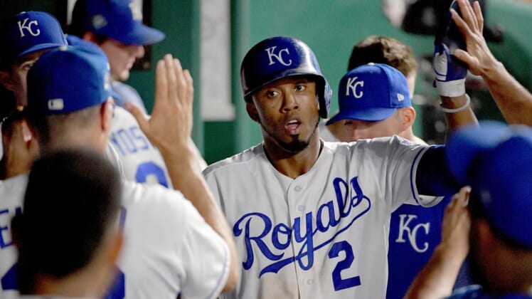 Sep 15, 2018; Kansas City, MO, USA; Kansas City Royals third baseman Alcides Escobar (2) is congratulated in the dugout after scoring in the seventh inning against the Minnesota Twins at Kauffman Stadium. The Royals won 10-3. Mandatory Credit: Denny Medley-USA TODAY Sports