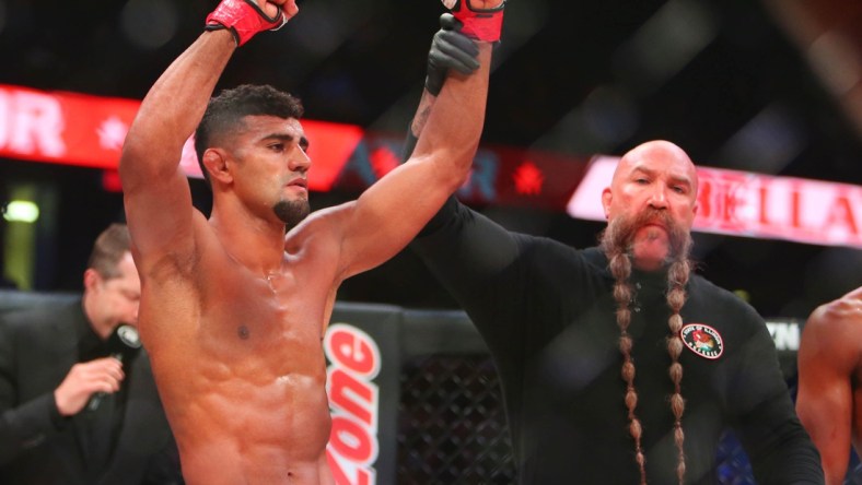 May 11, 2019; Rosemont, IL, USA;  Douglas Lima (red gloves) defeats Michael Page (blue gloves) during Bellator 221 at Allstate Arena. Mandatory Credit: Jerry Lai-USA TODAY Sports