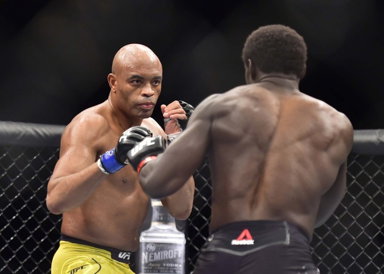 May 11, 2019; Rio de Janeiro, Brazil; Jared Cannonier (red gloves) fights Anderson Silva (blue gloves) during UFC 237 at Jeunesse Arena. Mandatory Credit: Jason Silva-USA TODAY Sports