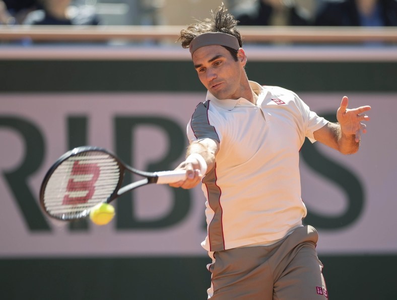 Jun 7, 2019; Paris, France: Roger Federer (SUI) in action during his match against Rafael Nadal (ESP) on day 13 of the 2019 French Open at Stade Roland Garros. Mandatory Credit: Susan Mullane-USA TODAY Sports