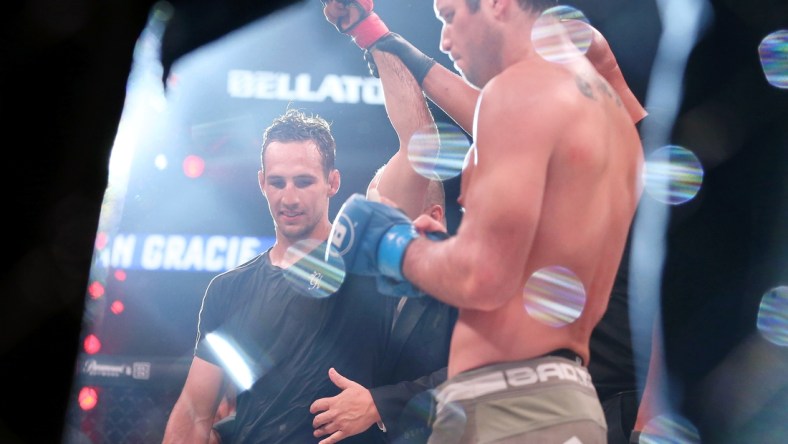 Jun 14, 2019; New York, NY, USA; Rory MacDonald (red gloves) after his win over Neiman Gracie (blue gloves) during Bellator 222 at Madison Square Garden. MacDonald won the fight. Mandatory Credit: Ed Mulholland-USA TODAY Sports