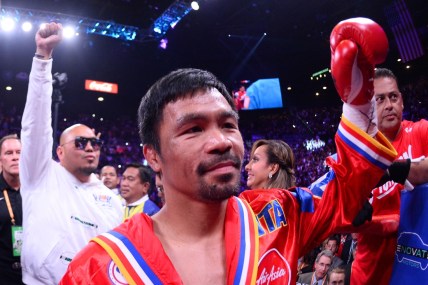 Jul 20, 2019; Las Vegas, NV, USA; Manny Pacquiao enters the ring to face Keith Thurman (not pictured) for their WBA welterweight championship bout at MGM Grand Garden Arena. Pacquiao won via split decision. Mandatory Credit: Joe Camporeale-USA TODAY Sports