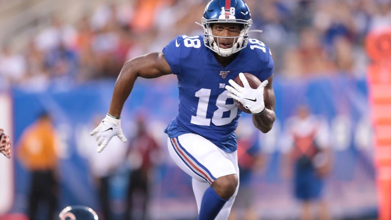 Aug 16, 2019; East Rutherford, NJ, USA; New York Giants wide receiver Bennie Fowler (18) catches a pass and runs for a touchdown during the first half against the Chicago Bears at MetLife Stadium. Mandatory Credit: Vincent Carchietta-USA TODAY Sports