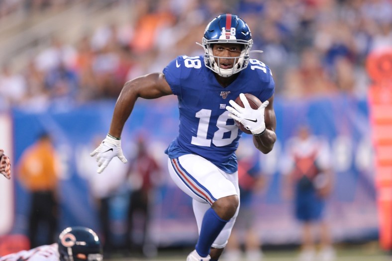 Aug 16, 2019; East Rutherford, NJ, USA; New York Giants wide receiver Bennie Fowler (18) catches a pass and runs for a touchdown during the first half against the Chicago Bears at MetLife Stadium. Mandatory Credit: Vincent Carchietta-USA TODAY Sports