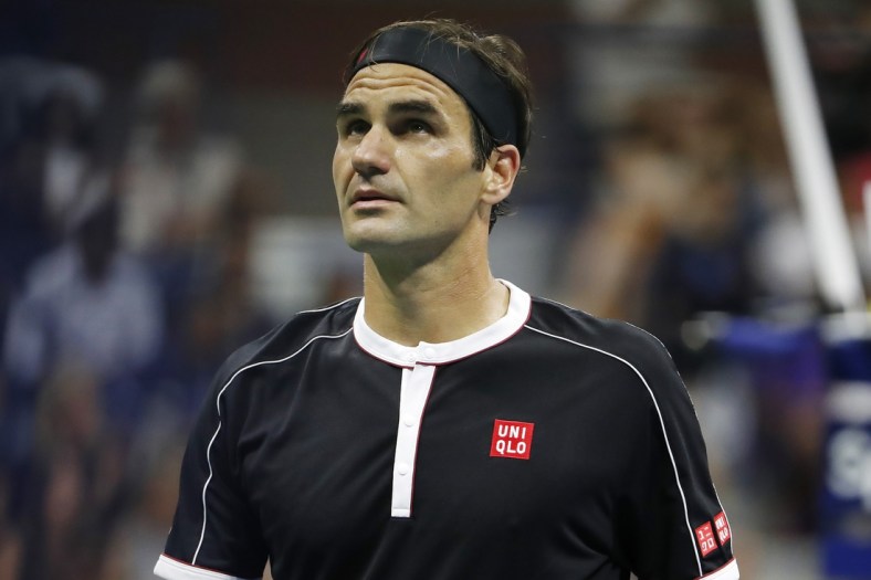 Sep 3, 2019; Flushing, NY, USA; Roger Federer of Switzerland looks at the board between points against Grigor Dimitrov of Bulgaria (not pictured) in a quarterfinal match on day nine of the 2019 US Open tennis tournament at USTA Billie Jean King National Tennis Center. Mandatory Credit: Geoff Burke-USA TODAY Sports