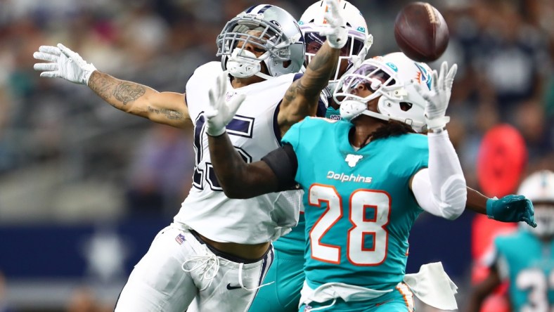 Sep 22, 2019; Arlington, TX, USA; Dallas Cowboys receiver Devin Smith (15) can not make the catch in the second quarter against Miami Dolphins safety Bobby McCain (28) at AT&T Stadium. Mandatory Credit: Matthew Emmons-USA TODAY Sports