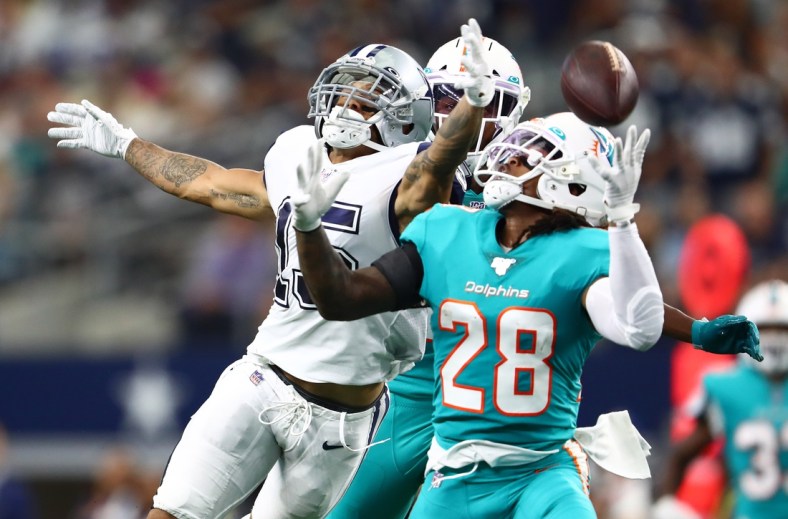 Sep 22, 2019; Arlington, TX, USA; Dallas Cowboys receiver Devin Smith (15) can not make the catch in the second quarter against Miami Dolphins safety Bobby McCain (28) at AT&T Stadium. Mandatory Credit: Matthew Emmons-USA TODAY Sports