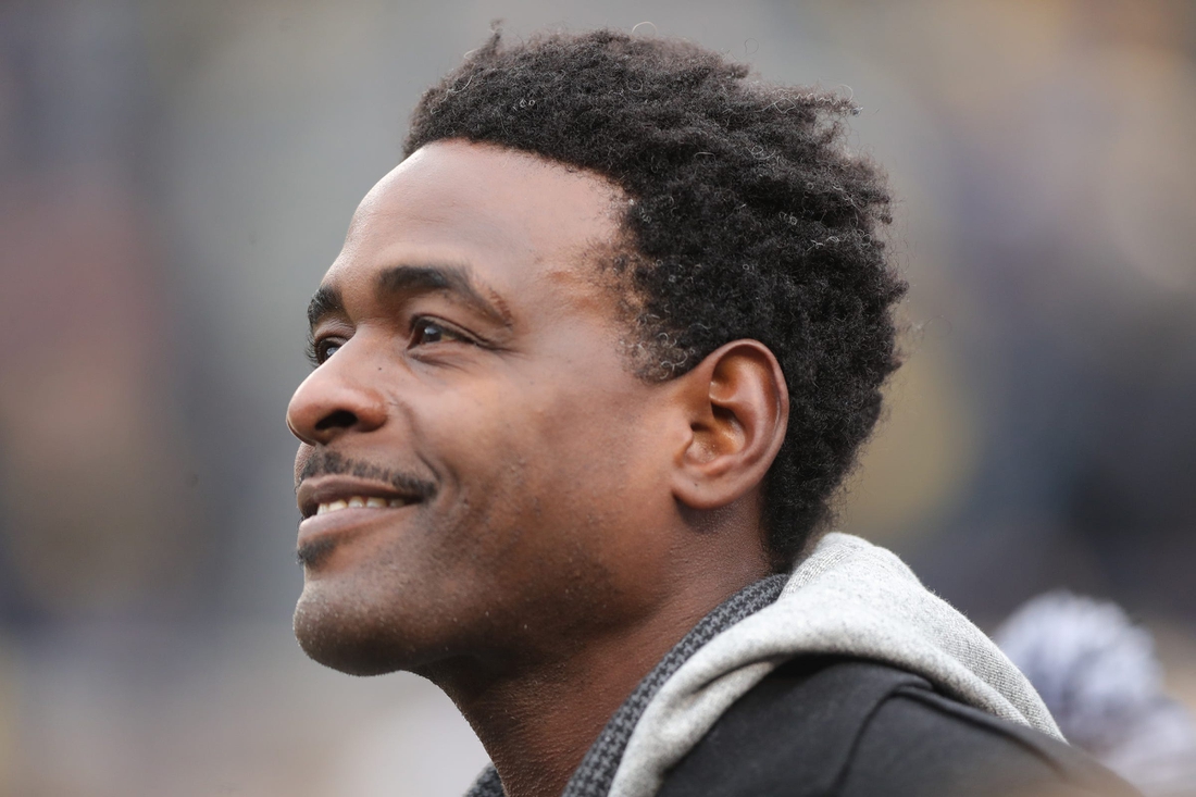 Chris Webber watches the Michigan Wolverines warm up before action against the Ohio State Buckeyes Saturday, November 30, 2019 at Michigan Stadium in Ann Arbor, Mich.

Michigan Football