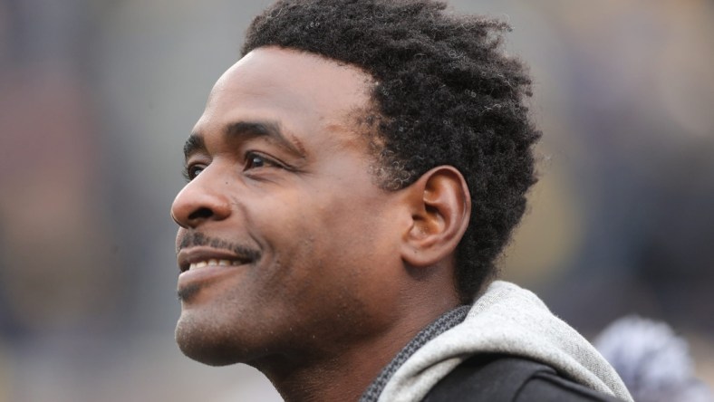 Chris Webber watches the Michigan Wolverines warm up before action against the Ohio State Buckeyes Saturday, November 30, 2019 at Michigan Stadium in Ann Arbor, Mich.

Michigan Football