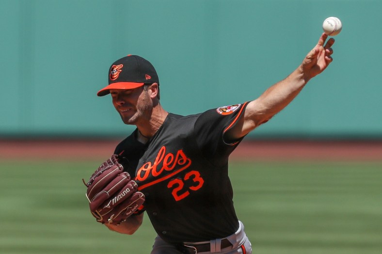 Jul 26, 2020; Boston, Massachusetts, USA; Baltimore Orioles starting pitcher Wade LeBlanc (23) throws a pitch during the third inning against the Boston Red Sox at Fenway Park. Mandatory Credit: Paul Rutherford-USA TODAY Sports