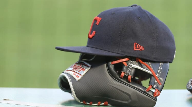 Aug 19, 2020; Pittsburgh, Pennsylvania, USA;  Cleveland Indians hats and glove on the dugout rail against the Pittsburgh Pirates during the third inning at PNC Park. The Indians won 6-1. Mandatory Credit: Charles LeClaire-USA TODAY Sports