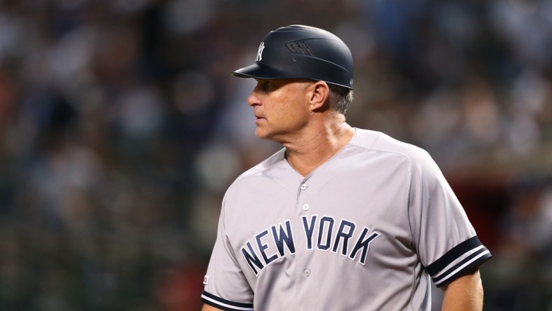 Apr 30, 2019; Phoenix, AZ, USA; New York Yankees third base coach Phil Nevin against the Arizona Diamondbacks at Chase Field. Mandatory Credit: Mark J. Rebilas-USA TODAY Sports