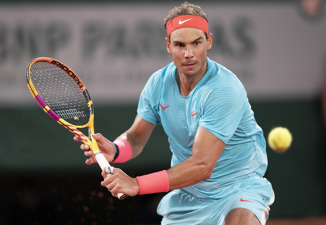 Oct 11, 2020;  Paris, France; Rafael Nadal (ESP) in action during his match against Novak Djokovic (SRB) on day 15 at Stade Roland Garros. Mandatory Credit: Susan Mullane-USA TODAY Sports