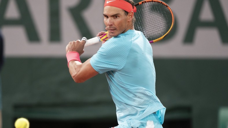 Oct 11, 2020;  Paris, France; Rafael Nadal (ESP) in action during his match against Novak Djokovic (SRB) on day 15 at Stade Roland Garros. Mandatory Credit: Susan Mullane-USA TODAY Sports