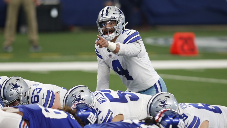 Oct 11, 2020; Arlington, Texas, USA; Dallas Cowboys quarterback Dak Prescott (4) calls a play in the second quarter against the New York Giants at AT&T Stadium. Mandatory Credit: Tim Heitman-USA TODAY Sports