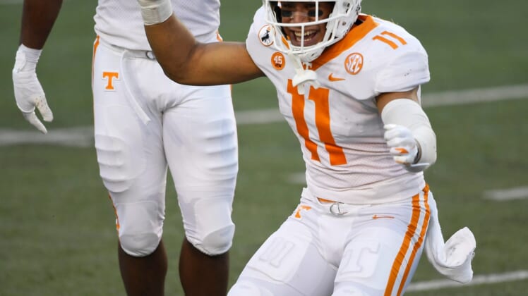 Tennessee linebacker Henry To'o To'o (11) celebrates his first down after a catch on a fake punt during the second quarter at Vanderbilt Stadium Saturday, Dec. 12, 2020 in Nashville, Tenn.Gw55884