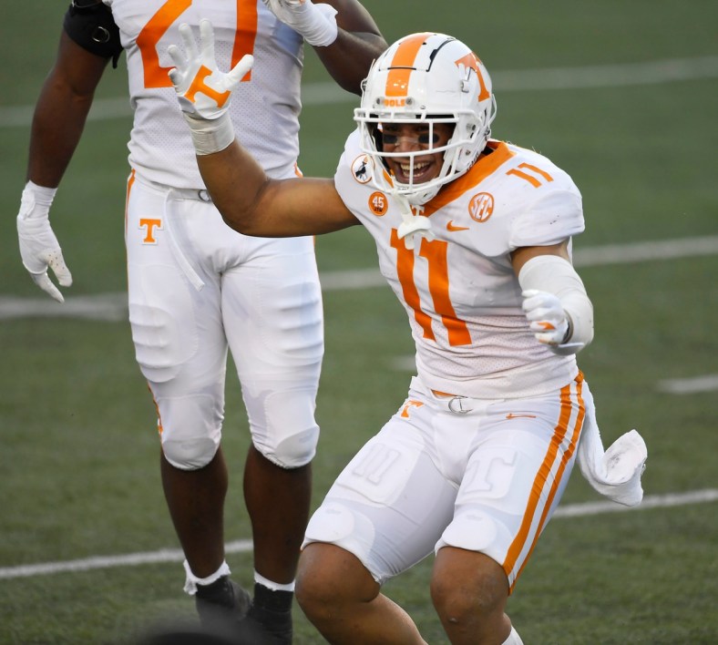 Tennessee linebacker Henry To'o To'o (11) celebrates his first down after a catch on a fake punt during the second quarter at Vanderbilt Stadium Saturday, Dec. 12, 2020 in Nashville, Tenn.

Gw55884